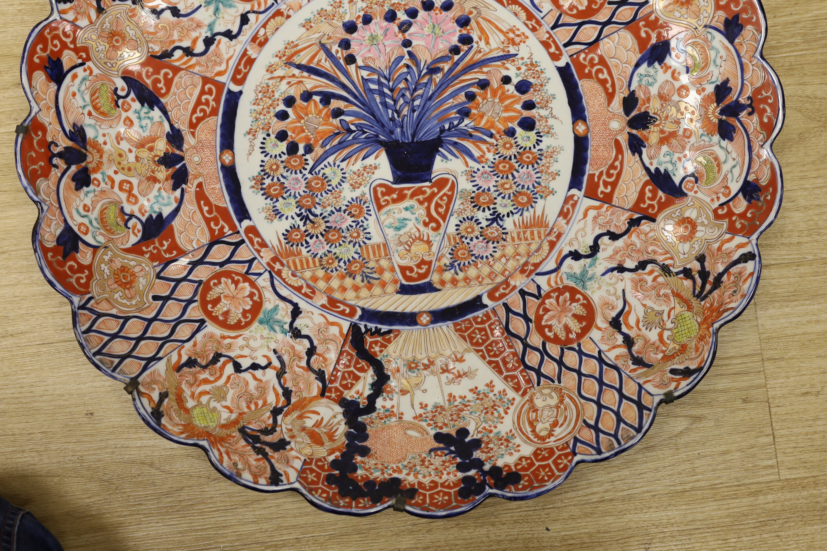 A large Japanese Imari floral charger, 58cm diameter